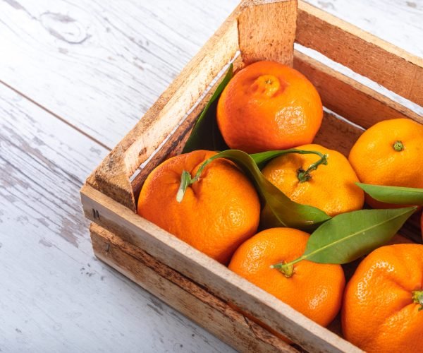 top view fresh oranges in wooden box