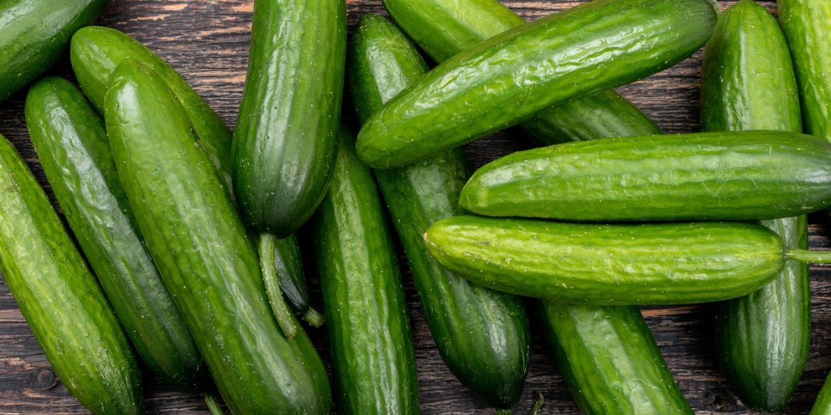 top-view-cucumber-brown-wooden-horizontal